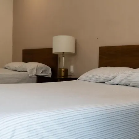 Infinity Suites Triple Room 103